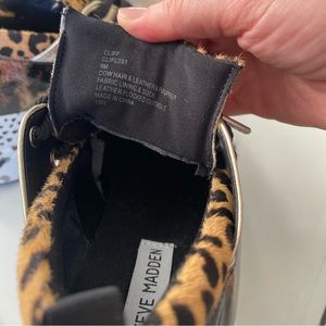 Black and leopard print sneakers, barely worn. Maybe twice.